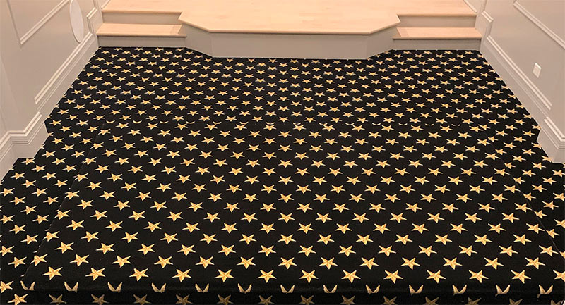 Black carpet with gold stars